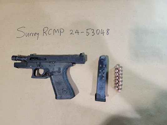 Black Handgun, Magazine, Bullets "Surrey RCMP 24-53048"