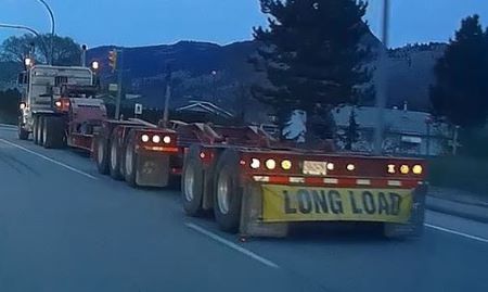 A rear image of the suspect vehicle on the roadway. 