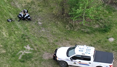 Officers arresting one suspect
