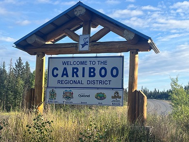 Highway sign that says &lsquo;Welcome to the Cariboo Regional District&rsquo;