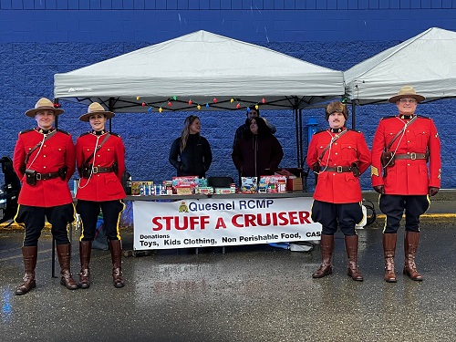 RCMP officers and volunteers at donation table