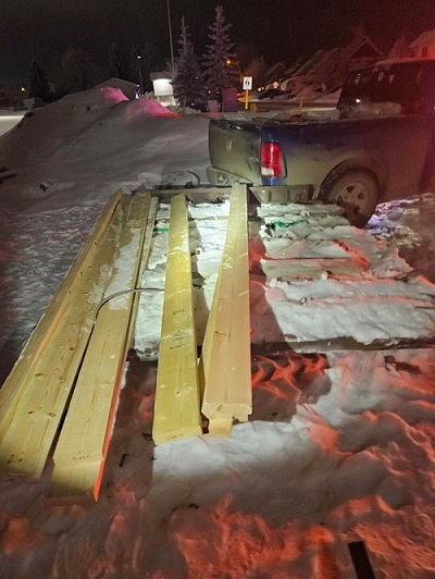 Stolen wood framing materials on a flatdeck trailer.