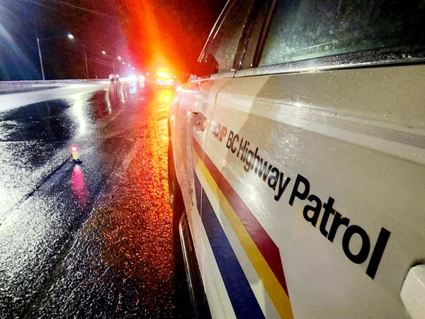 A rainy, winter BC Highway Patrol checkstop in Central BC
