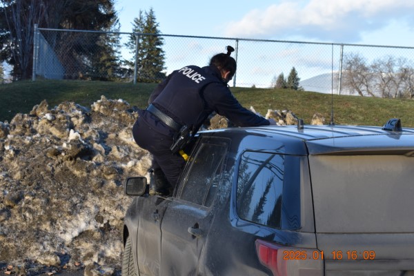 Constable Rosco P. Coltrane entering his police vehicle