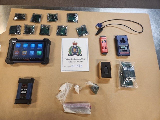 Photo of seized drugs and key fob programmer