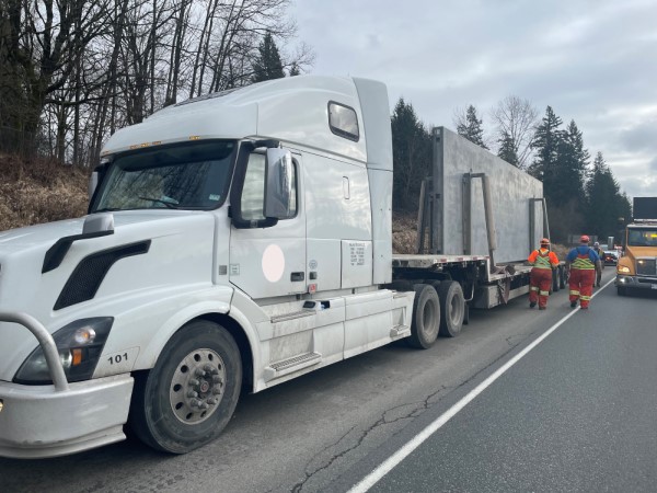 This tractor-trailer with a load of concrete struck both the 264 overpass and the CP Rail overpass on Highway #1 westbound