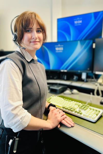 Angela  at the Island District 9-1-1 police dispatch centre