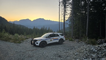 Photo of police car on a mountain road