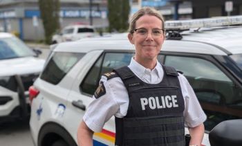 Inspector Kokkoris standing by police vehicle outside Ridge Meadows detachment