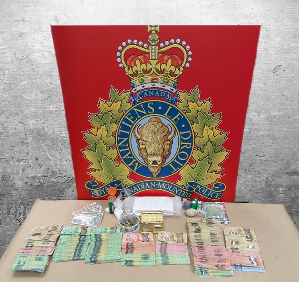 Photo of cash and drugs seized