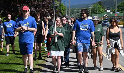 Torch run participant carrying torch