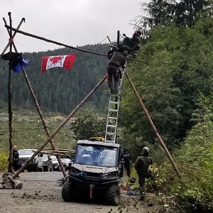 Image of individual being extracted from a tripod 