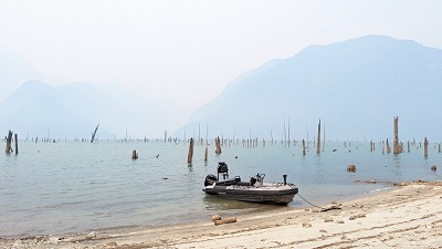Photo of police boat pulled up on beach