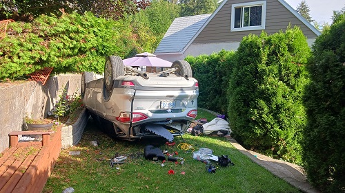 single vehicle rollover incident in the 500 block of Wellington Avenue, in Warfield, BC.