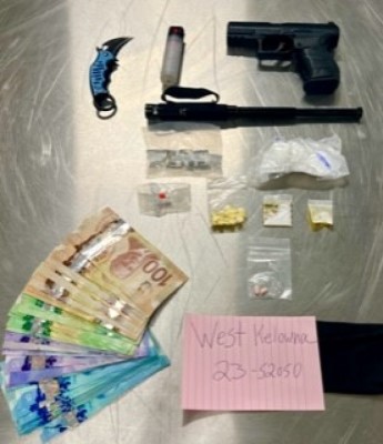 Displayed weapons, cash and drugs in baggies