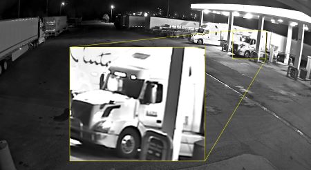 a white Volvo semi truck pulling an Ocean trailer was observed at a service station near Kamloops on Sept. 21, 2021. The photo features an inset of a closeup image of the truck&rsquo;s cab, which includes a logo on the driver&rsquo;s side door. 
