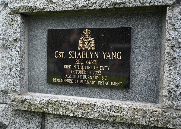 Cst. Shaelyn Yang&rsquo;s name on a black plaque on a stone cairn outdoors