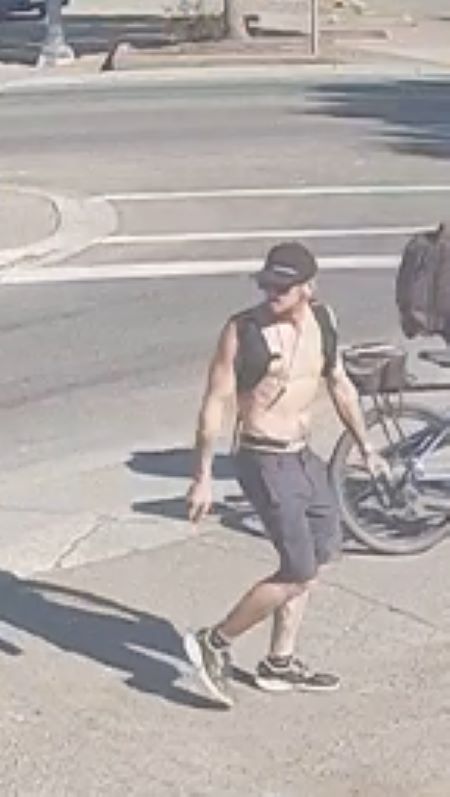&bull;&#9;Second male: shirtless and muscular, wearing grey or black knee length shorts, a black baseball hat, sunglasses, black and white running shoes, and has a black backpack