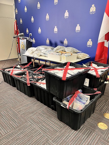 Police show case the seizure of drugs from a warehouse during an investigation