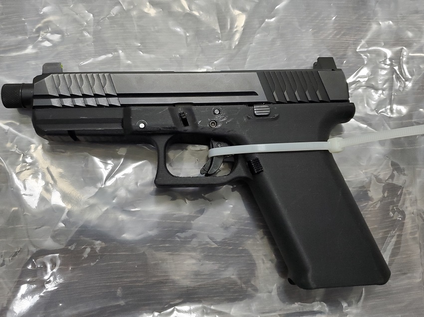 Black pistol with home made plastic grip