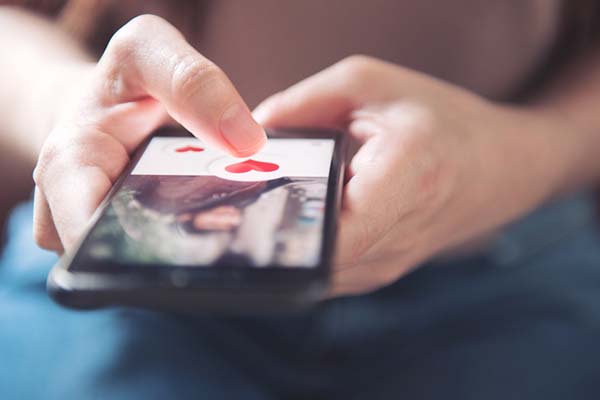 hands touching a phone