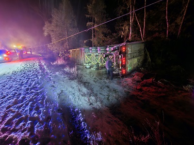 Tractor-trailer slips off the highway