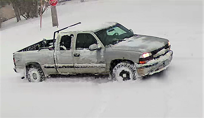 Photo of side view of suspect truck