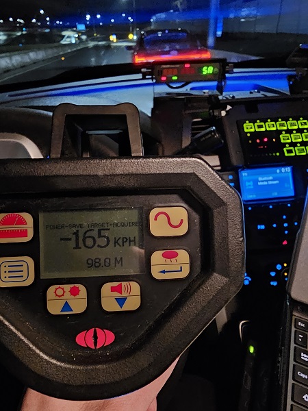 Picture of police laser displaying 165 km/hr speed